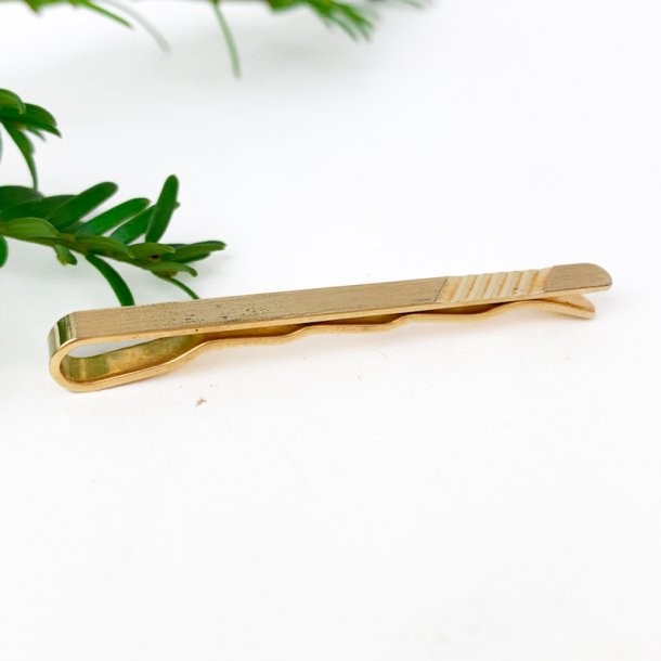 Goldfarbene Retro-Krawattennadel mit Muster