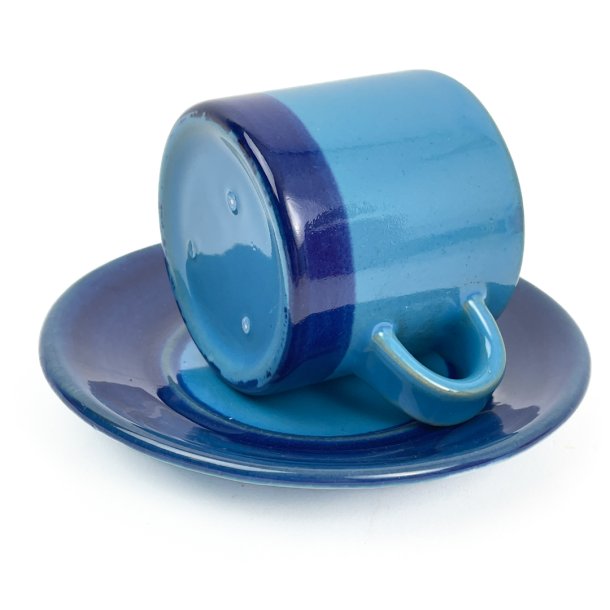 Trkis-blaue Vintage-Kaffeetasse mit Untertasse