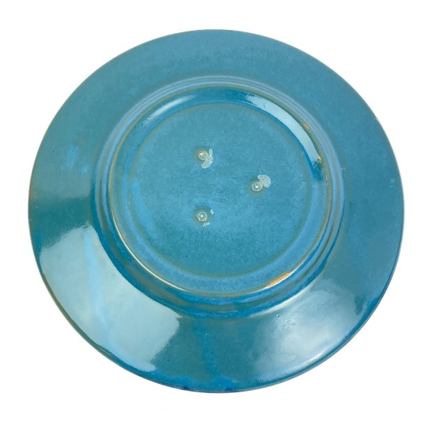 Trkis-blaue Vintage-Kuchenteller