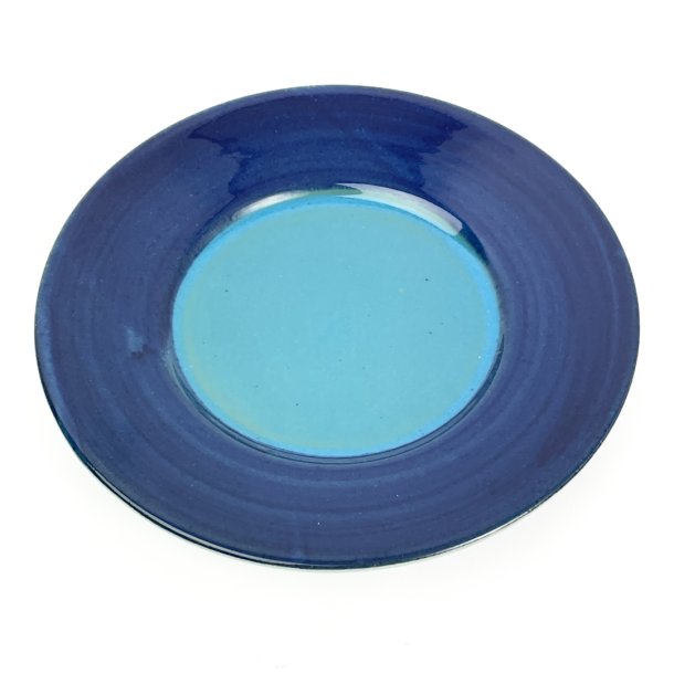 Trkis-blaue Vintage-Kuchenteller