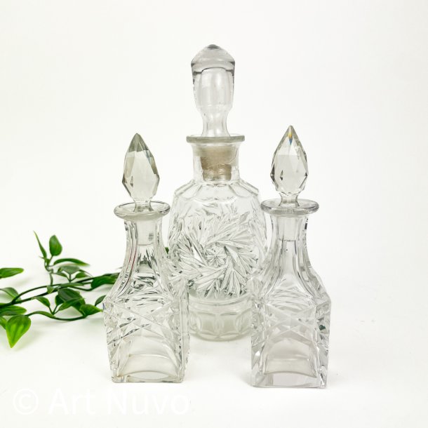 Tre vintage glasflakoner