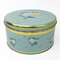 Hellblaue Vintage-Gebckdose mit Blumen