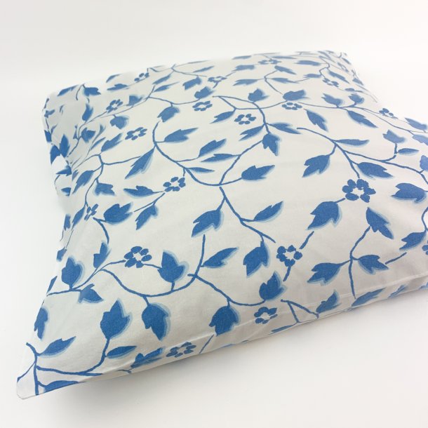 Et pudebetrk i hvid og bl