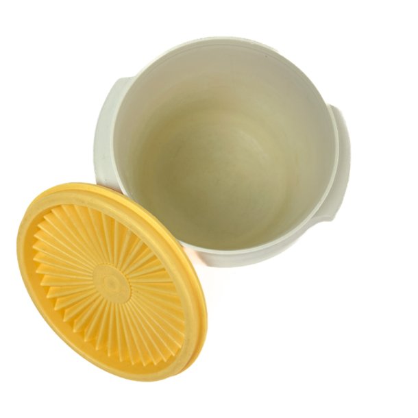 Vintage Tupperware plastb�tte med gul l�g