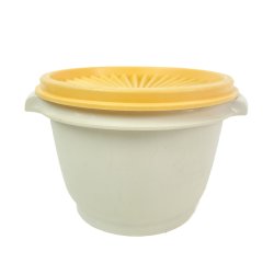 Vintage Tupperware plastb�tte med gul l�g