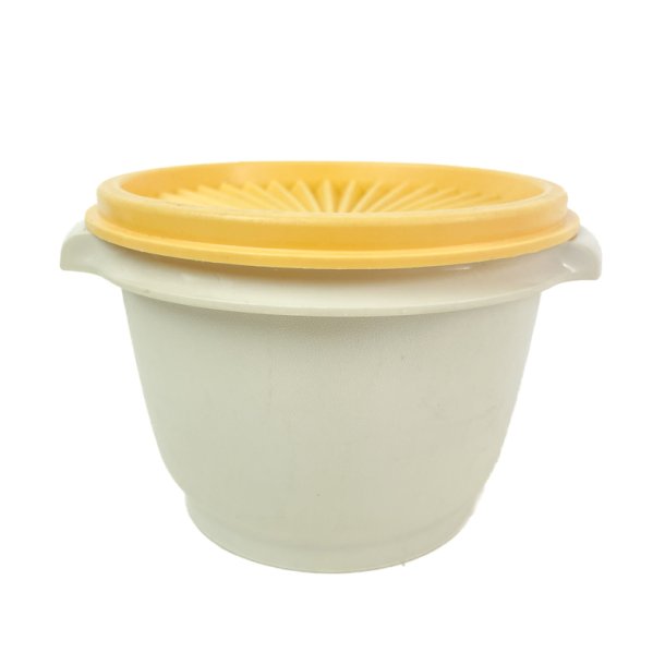 Vintage Tupperware plastb�tte med gul l�g