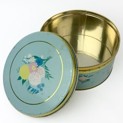 Hellblaue Vintage-Gebckdose mit Blumen