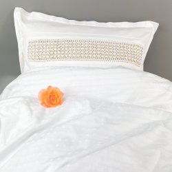 Hvidt vintage sengetj med mellemvrk