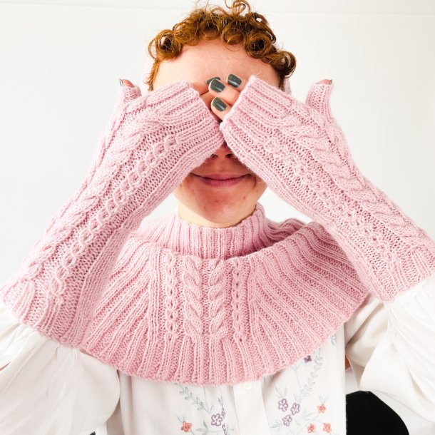 Vinter st i lys rosa uld.