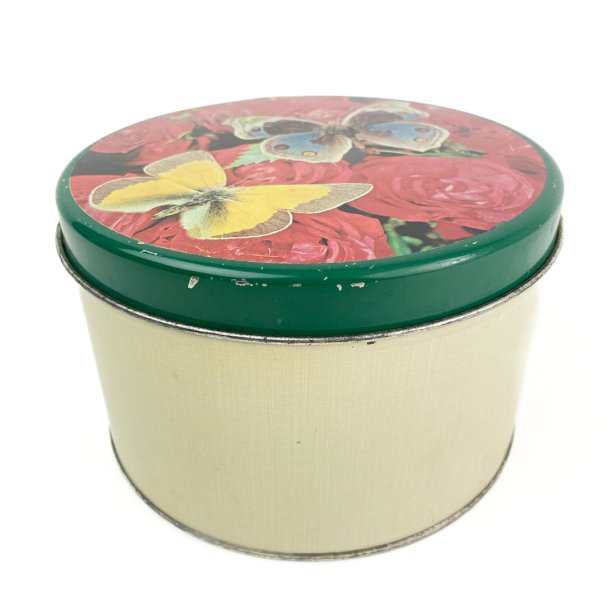 Vintage kagedse med sommerfugle og roser