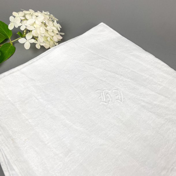 To hvide damask mundservietter