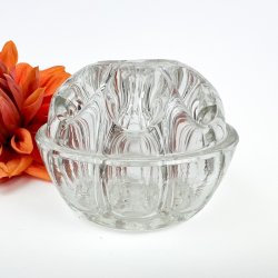 Dekorativ vintage blomsterfakir i glas