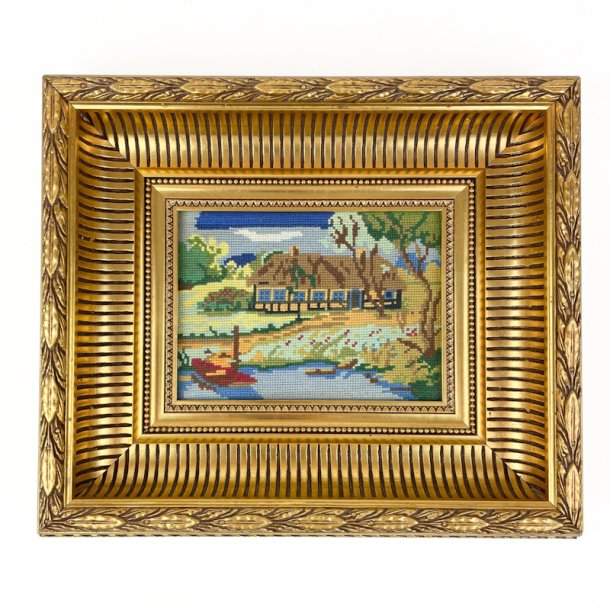 Broderet vintage billede med guldramme