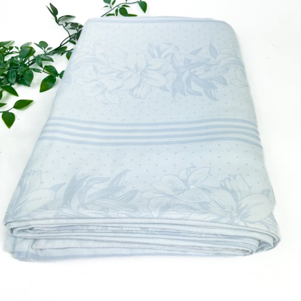 Lyseblt damask sengetj med blomster