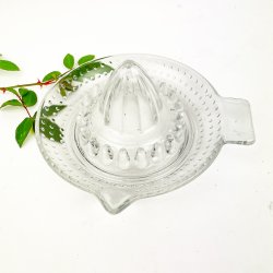 Prikket vintage citronpresser i glas