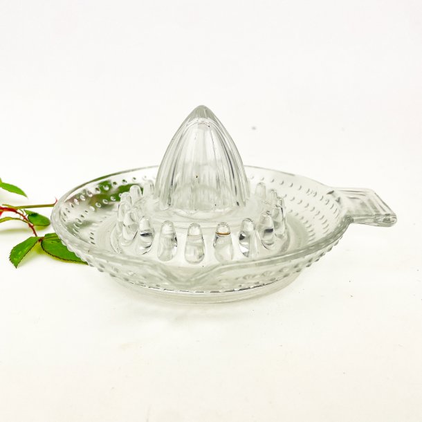 Prikket vintage citronpresser i glas