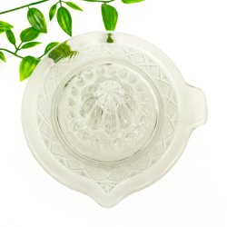 Vintage citronpresser i presset glas