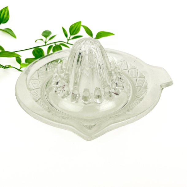 Vintage citronpresser i presset glas