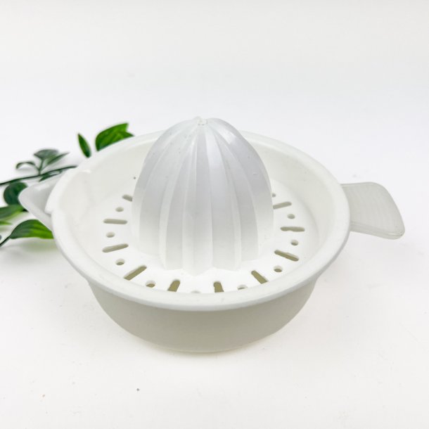 Hvid retro citruspresser med h�ldetud
