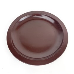 Dunkler Retro-Rosti-Kuchenteller