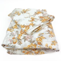 Et st vintage sengetj med blomster