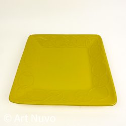 Gult retro serveringsfad med citroner