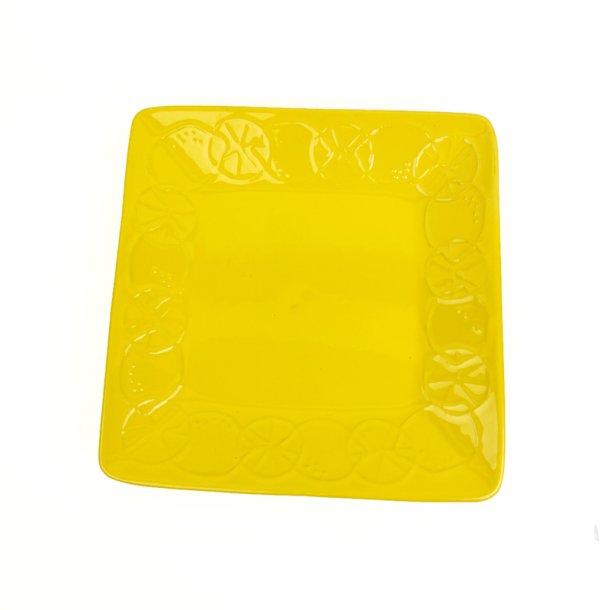 Gult retro serveringsfad med citroner