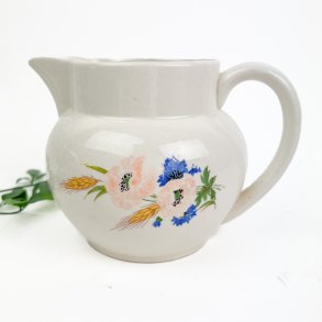 Vintage fajancekande blomster