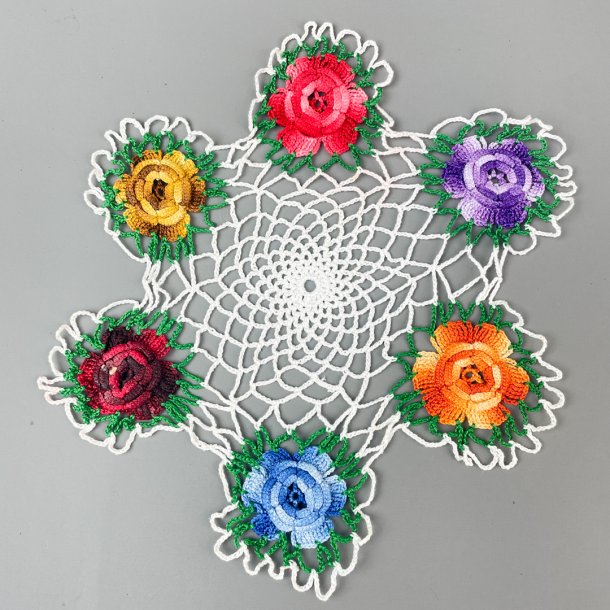 Hklet flakon med farverige blomster 