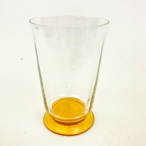 Ravgult vintage �lglas p� fod