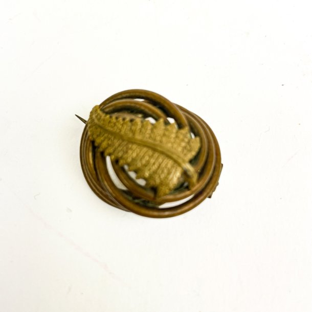 Dekorativ bladformet vintage broche