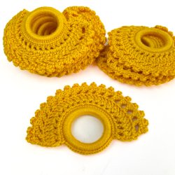 Ti gule vintage servietringe