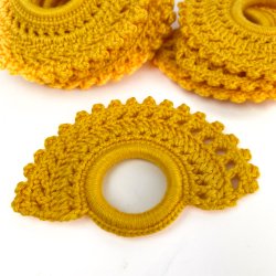 Ti gule vintage servietringe