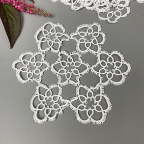 Ti hvide orkerede mellemlgsservietter