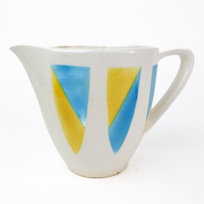 Retro blau-gelbe Fayencekanne