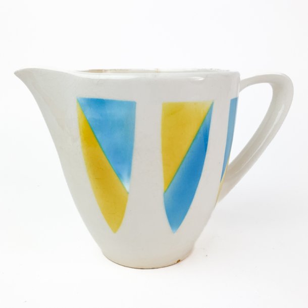 Retro blau-gelbe Fayencekanne