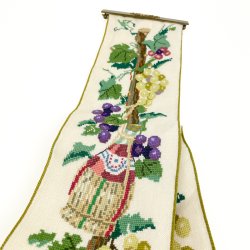Lang vintage klokkestreng med vinmotiv