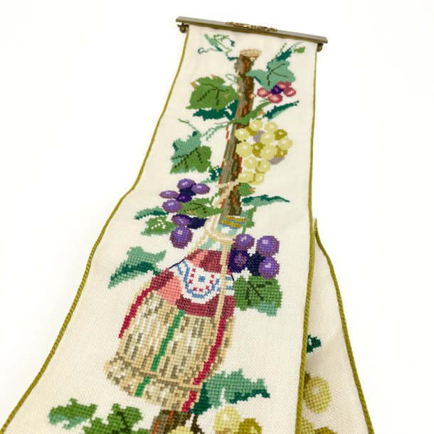 Lang vintage klokkestreng med vinmotiv