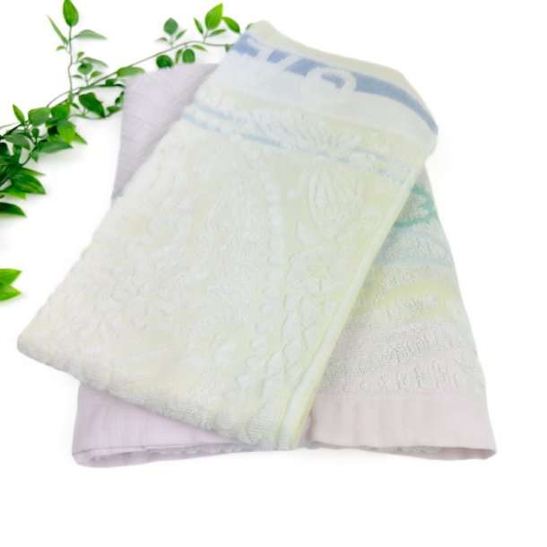 To pastelfarvede vintage h�ndkl�der