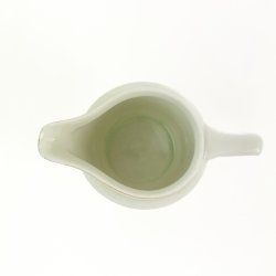 Lille vintage kande med blomsterbort