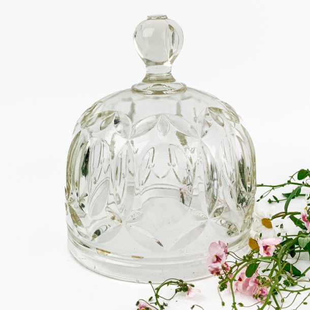 Vintage osteklokke i presset glas