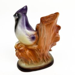 Retro fuglefigur med vindruer