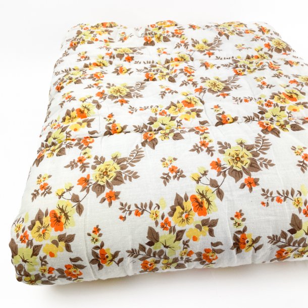 Vintage vattppe med gule og orange blomster