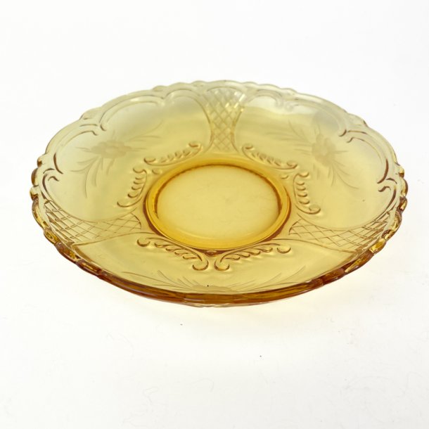 Ravfarvet vintage asiet i glas