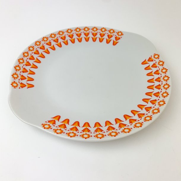 Retrofad fra 1970erne med orange blomster