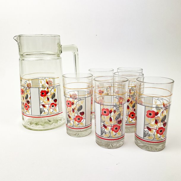Seks glas og kande med blomstermotiv