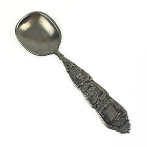 Vintage tin ske med motiv