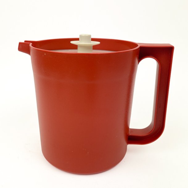Rustfarvet retro Tupperware kande
