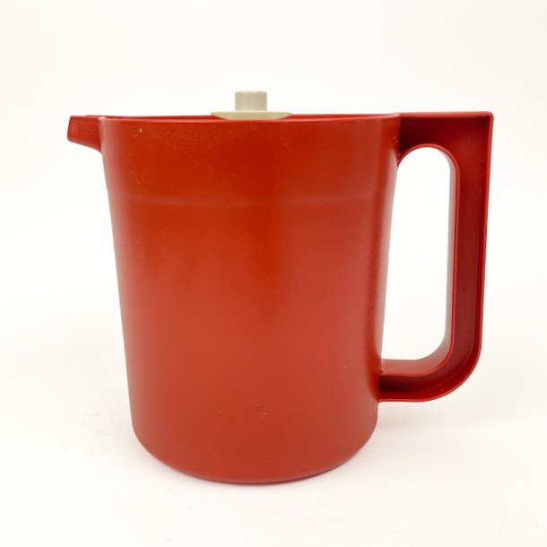 Rustfarvet retro Tupperware kande