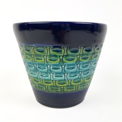 Dekorativ bl� retro urtepotteskjuler